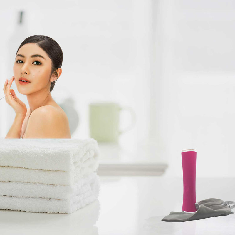 Foreo Espada Blue Light Therapy Device On Counter With Person In Background Looking Back With Face Clear
