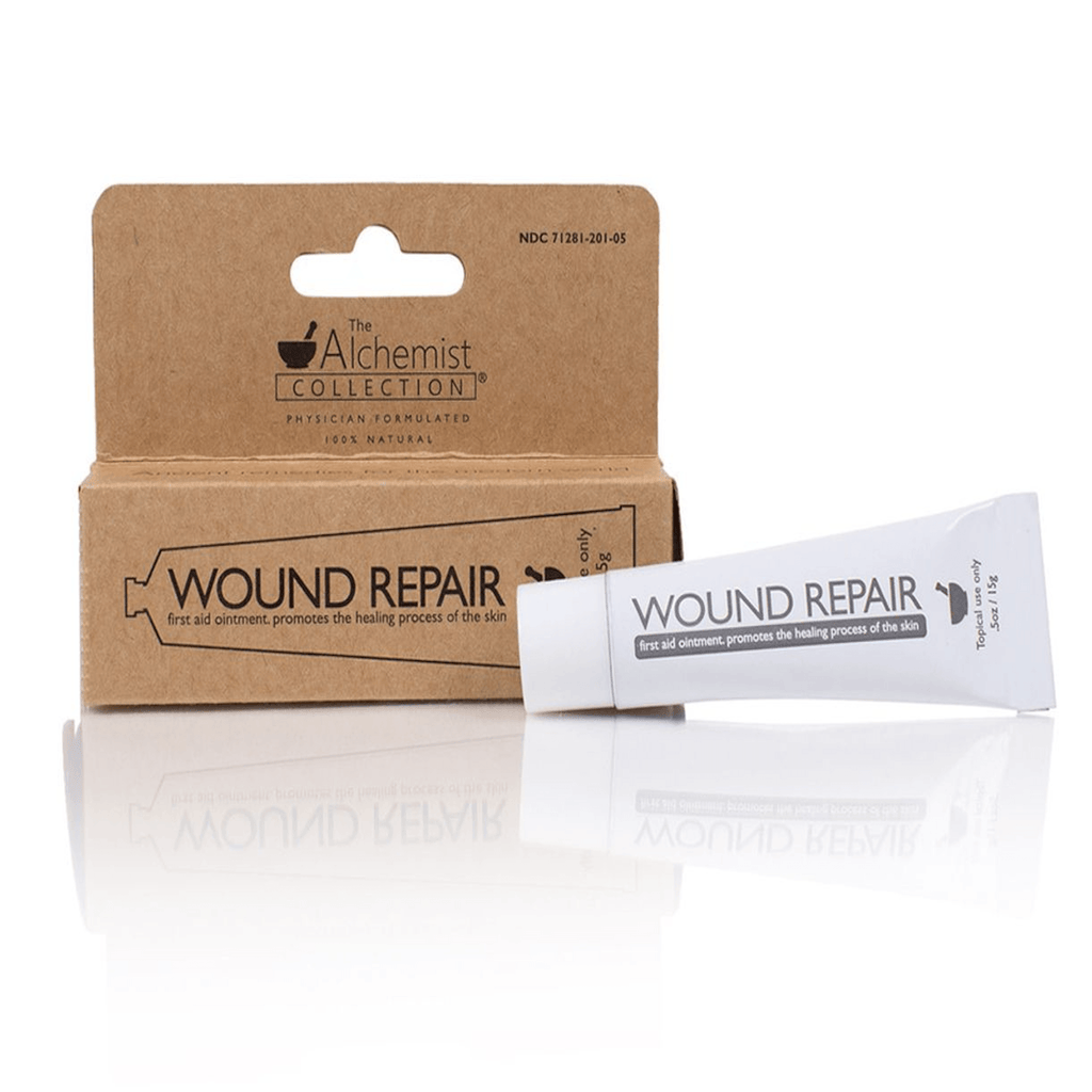 The Alchemist Collection All natural Wound Repair tube next to box white background