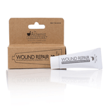 The Alchemist Collection All natural Wound Repair tube next to box white background